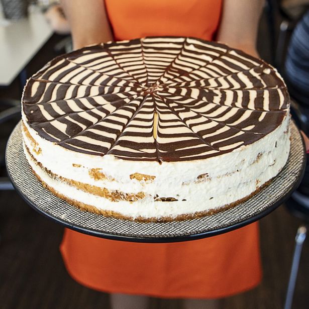 Cake with chocolate swirl decoration